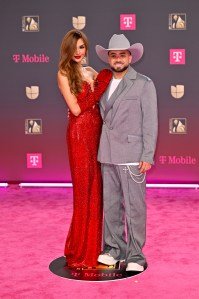MIAMI, FLORIDA - FEBRUARY 19: (L-R) Melany Mille and Nacho attend Univision's 38th Premio Lo Nuestro at Kaseya Center on February 19, 2026 in Miami, Florida. (Photo by Ivan Apfel/Getty Images)
