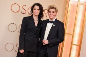 Catherine Shepherd and Brandi Carlile at the 98th Annual Oscars held at Dolby Theatre on March 15, 2026 in Hollywood, California.