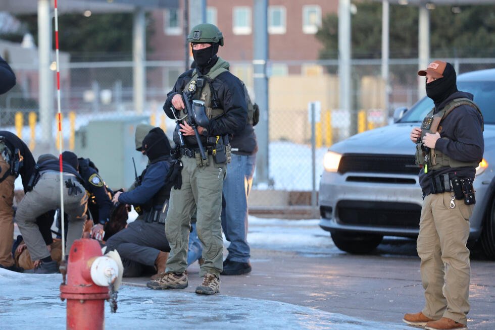ICE agents apprehend a person in Minneapolis, Minnesota, on January 9, 2026