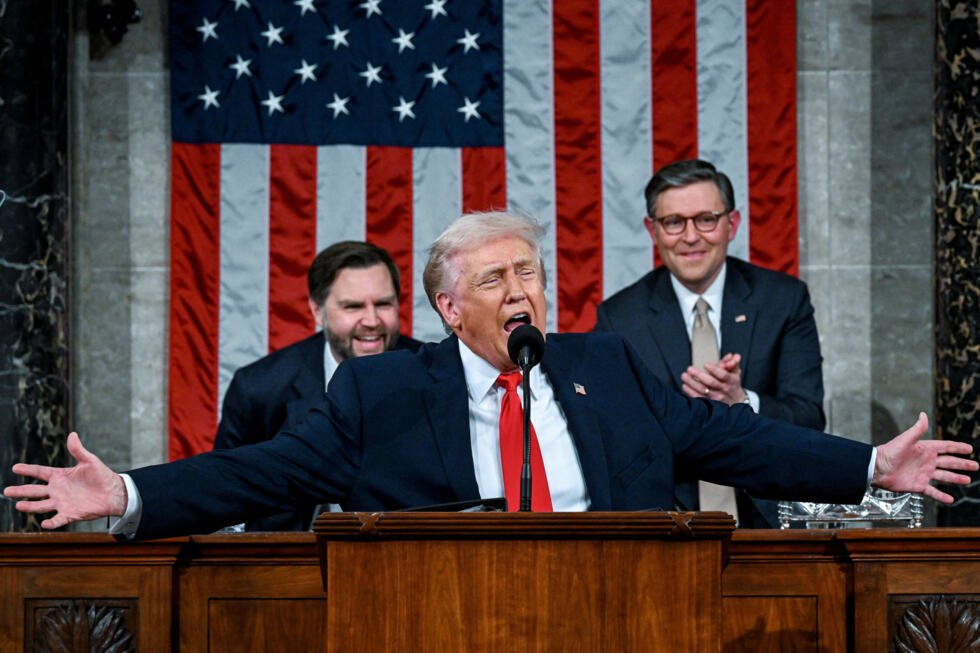US President Donald Trump delivers the State of the Union address to Congress with vice president JD Vance and speaker of the house Mike Johnson seated behind him, on February 24, 2026