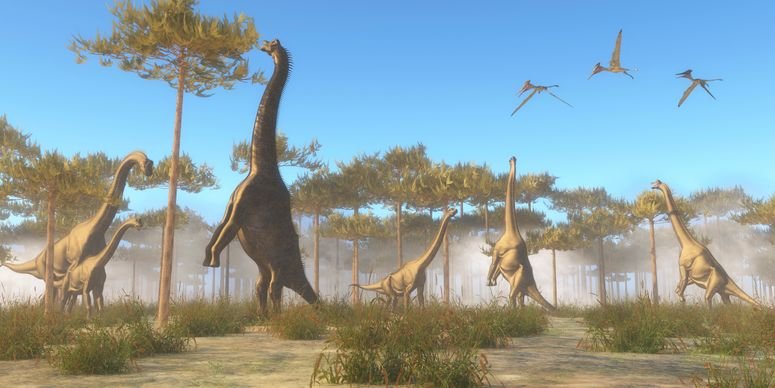 Dinosaurios comiendo durante la época del triásico.