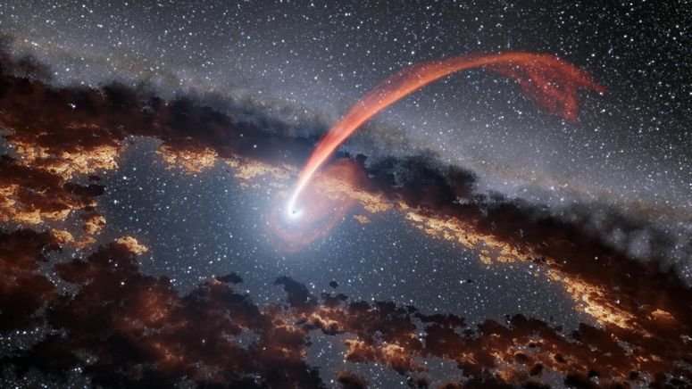 Esta ilustración muestra un flujo brillante de material de una estrella mientras está siendo devorada por un agujero negro supermasivo