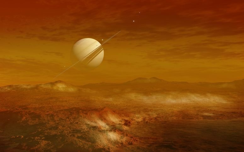 Imagen conceptual sobre cómo se vería Saturno desde la superficie de Titán, una de sus lunas.